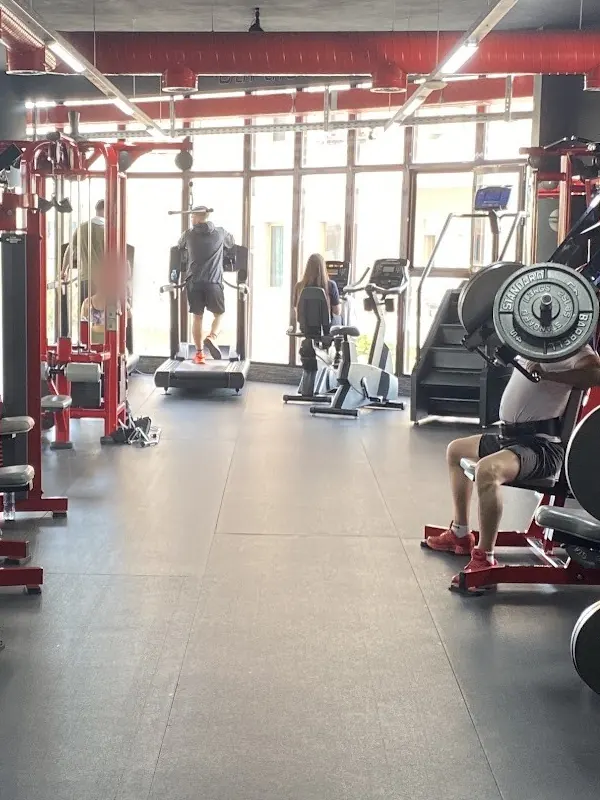 Treadmills and bikes at the far end of the training floor